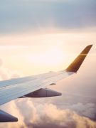 Sunrise over aeroplane wing