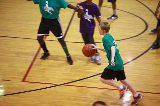 Boys playing basketball