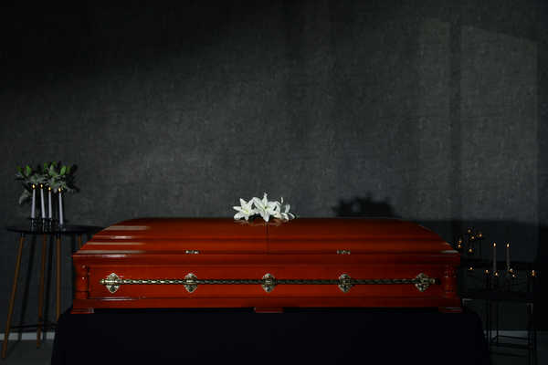 Coffin with lilies