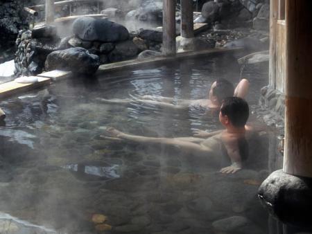 Men relaxing in a hot spring