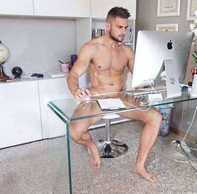 Man sitting at desk with a computer