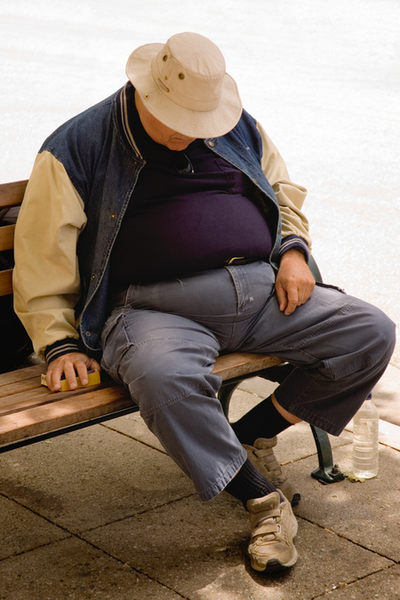 Man asleep on bench