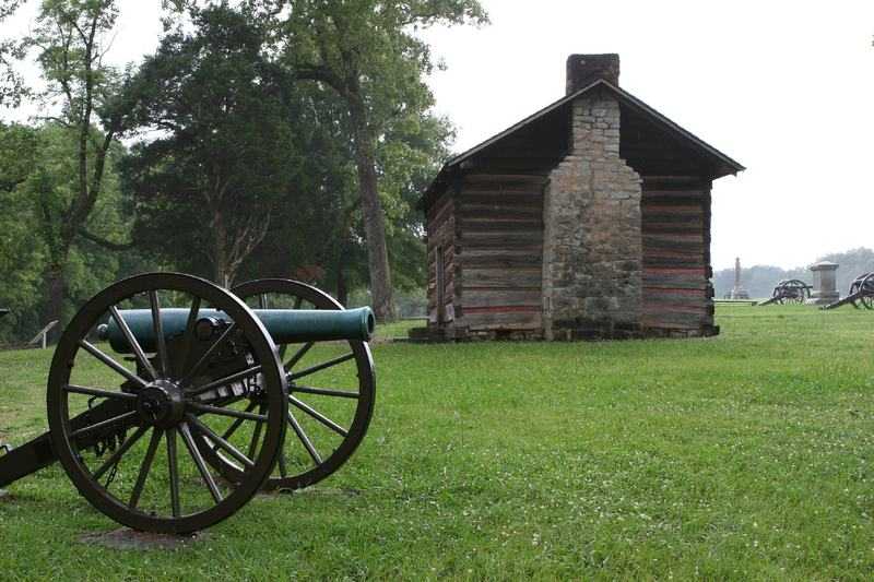 Historic cabin and civil war era cannon